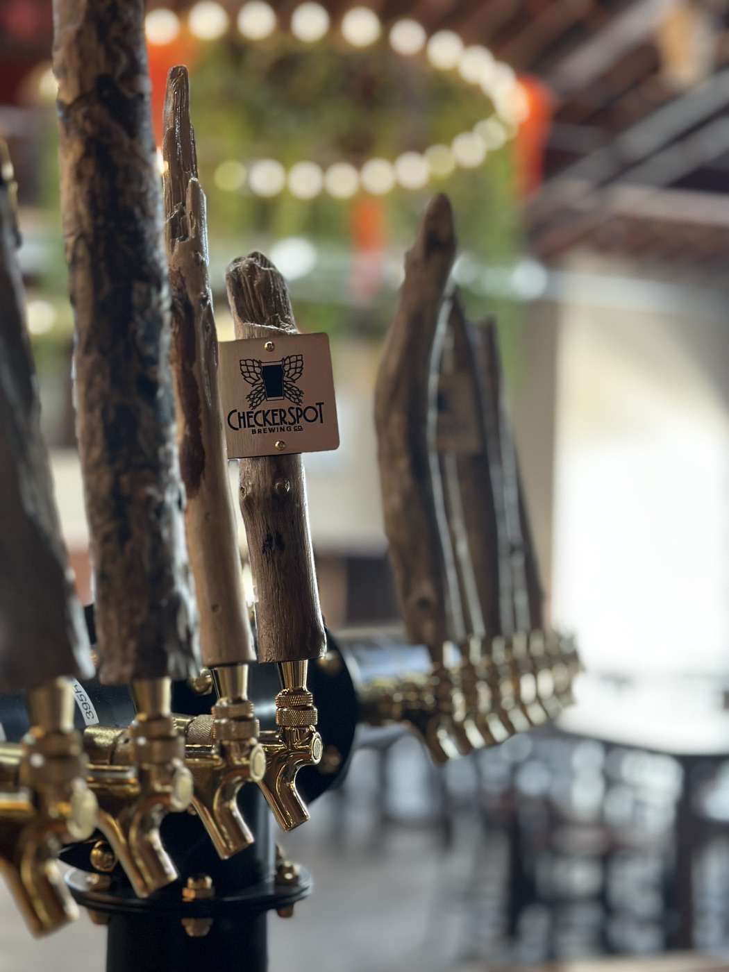 Driftwood tap handles at the Checkerspot bar